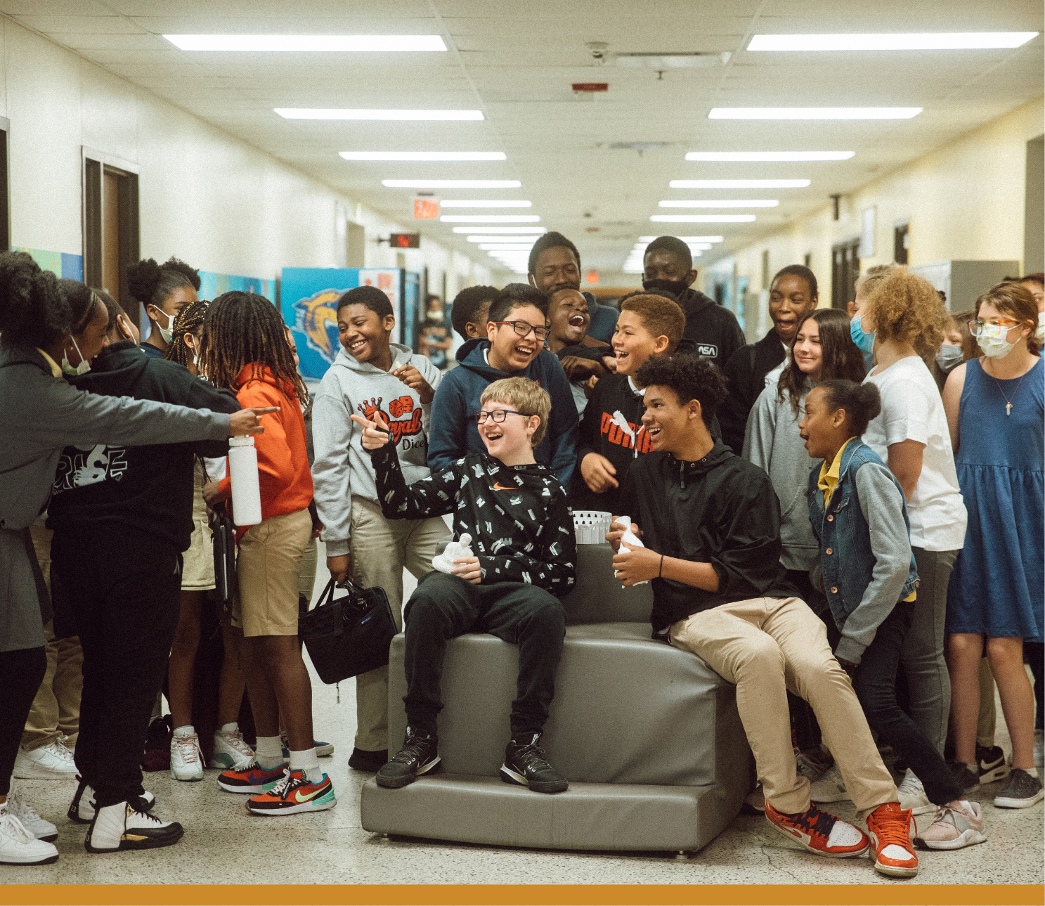 group of children in a school hallway