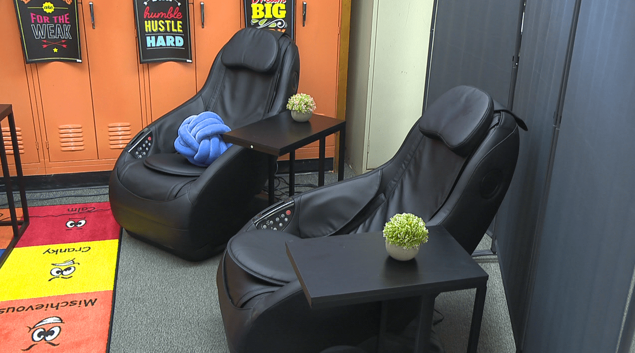 Two massage chairs in a wellness room